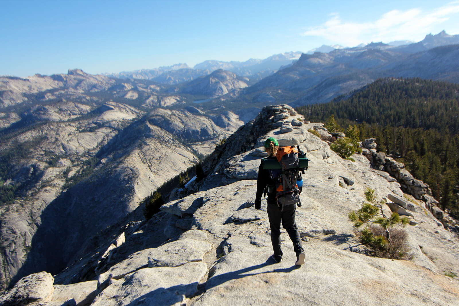 man standing on mountain top